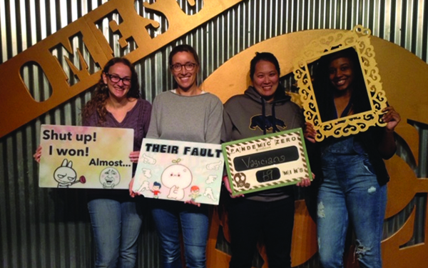 GYN Team taking a photo after an Escape Room attempt